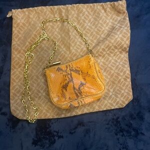 Vibrant Orange Crossbody Bag with Gold Chain